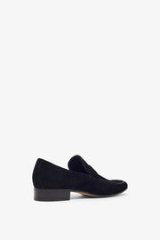 Man's black leather loafers
