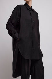 Elongated grey shirt