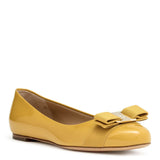 Varina medallion yellow patent ballerinas