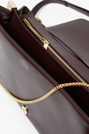 Front flap burgundy crossbody bag