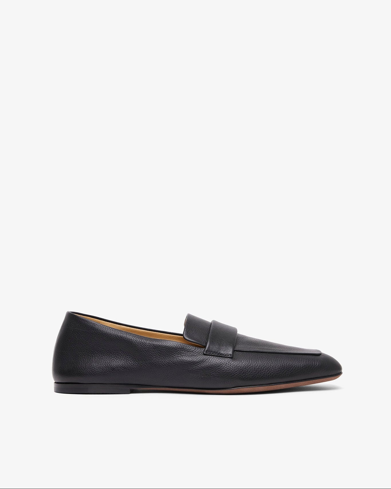 Black loafer shoe on a white background