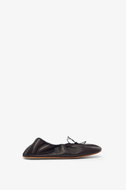 Round black ballet flats