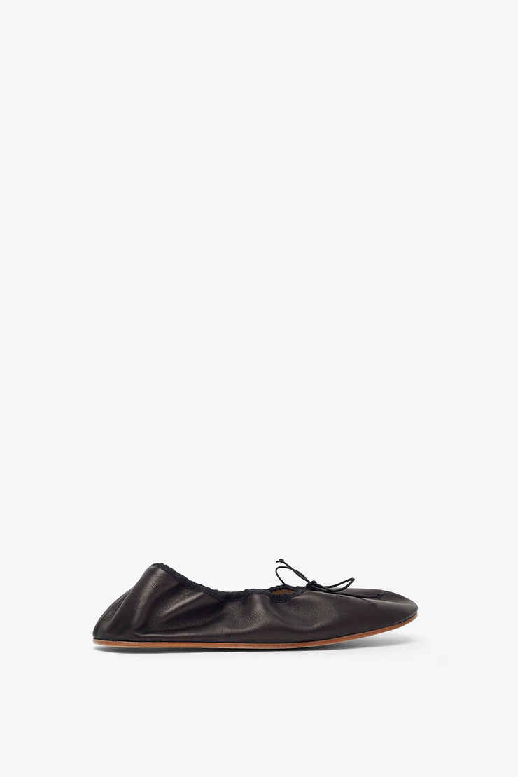 Round black ballet flats