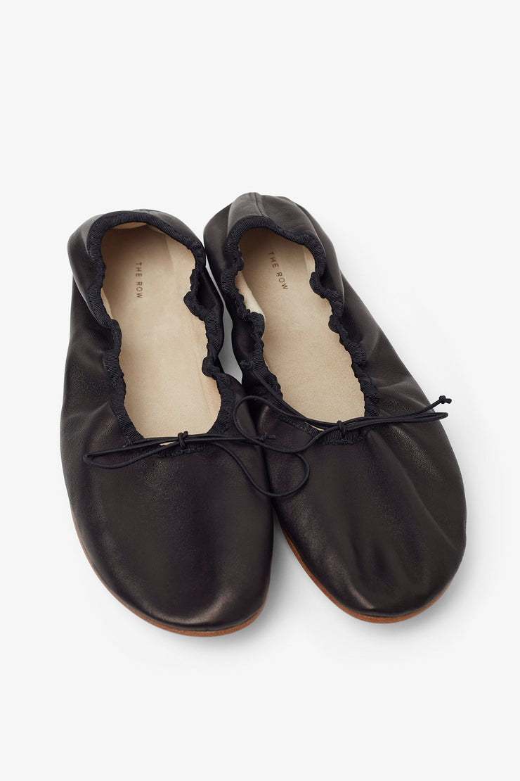 Round black ballet flats