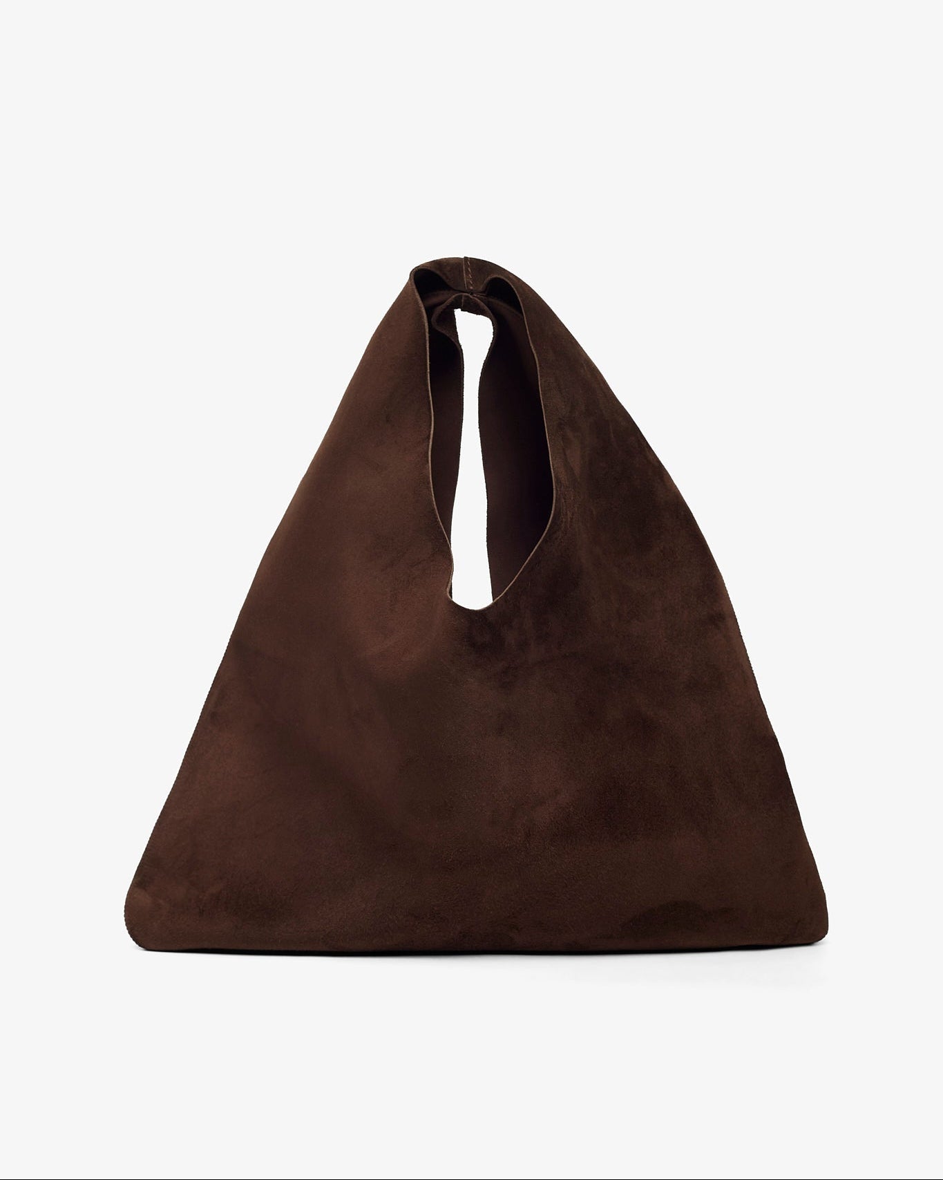 Brown suede handbag on a white background
