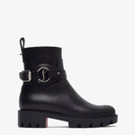 Black rain boot with a buckle on a white background