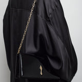Bettina black patent clutch