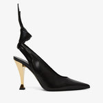 Black high-heeled shoe with a unique heel design on a white background